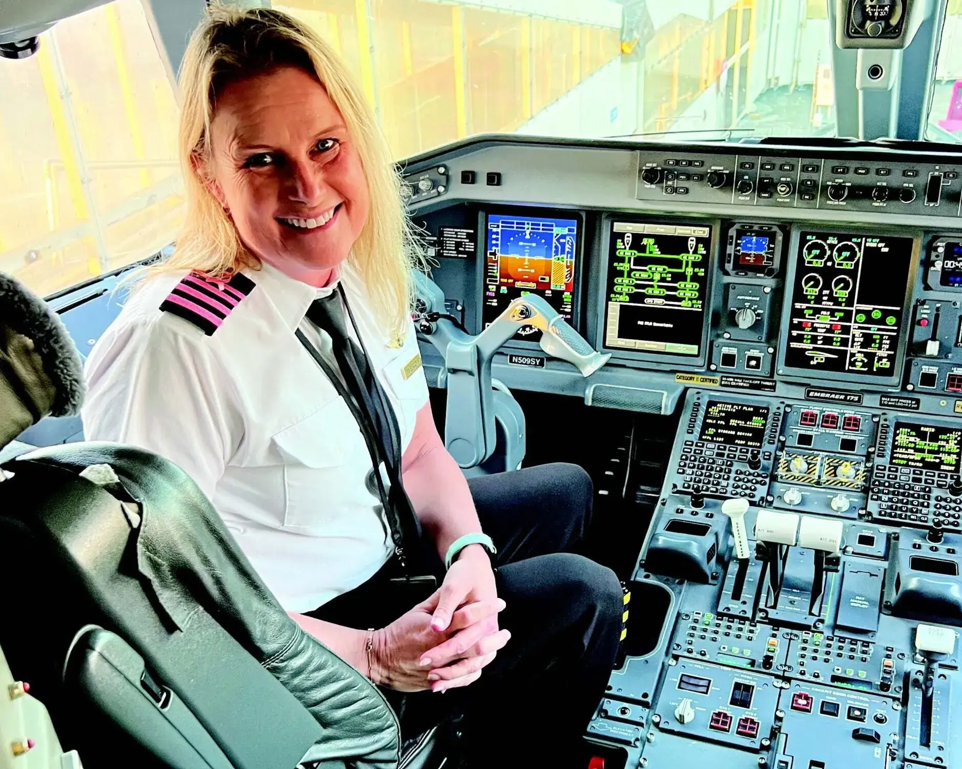 Airline pilot in the cockpit of a commercial jet